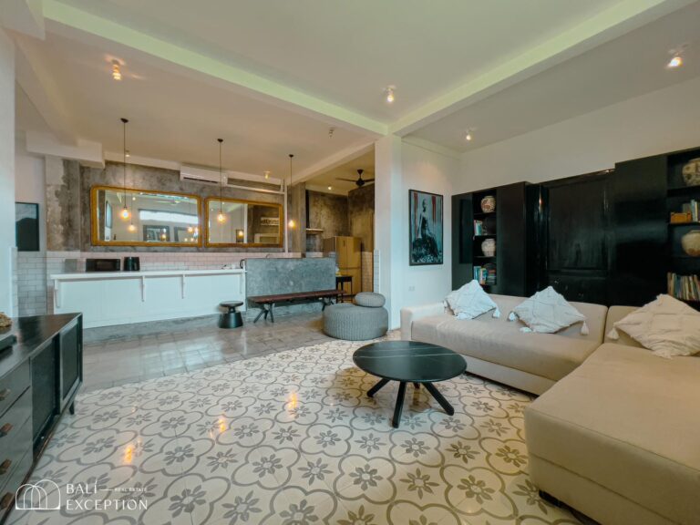 Modern living room with patterned tile floor.