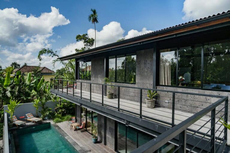 Modern house with pool and tropical greenery
