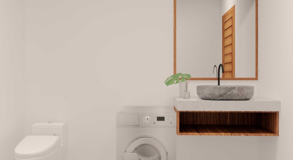 Modern bathroom with washer and stone sink.