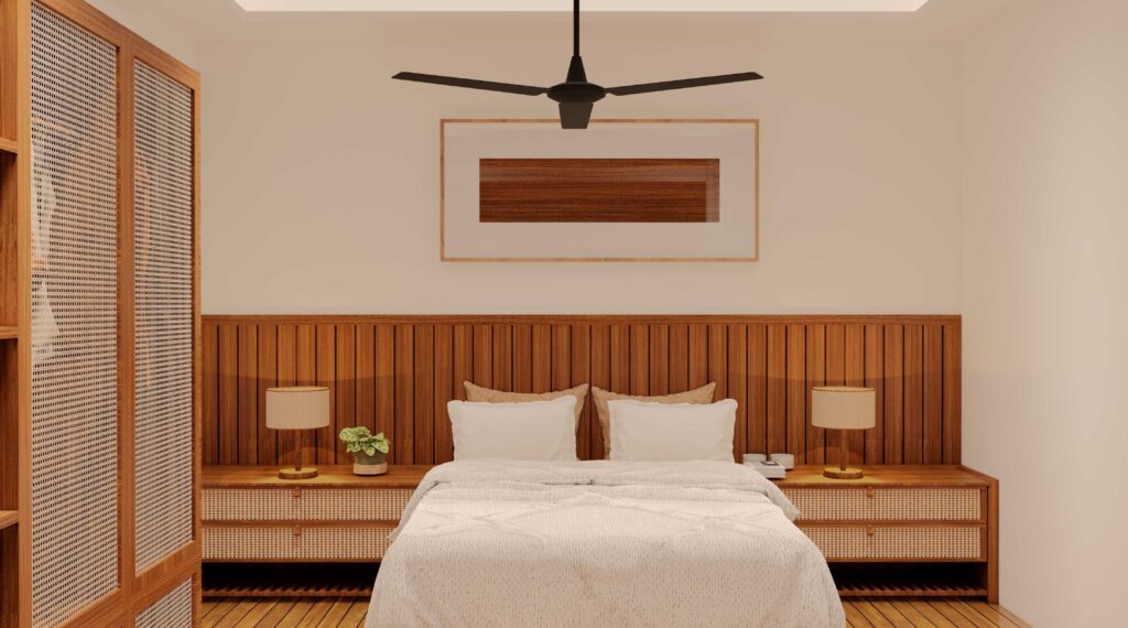 Cozy bedroom with wooden furniture and ceiling fan.