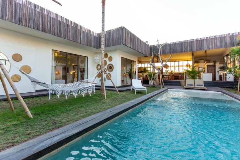 Modern tropical villa with pool and hammock