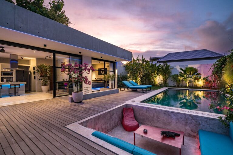 Modern patio with pool and sunset view