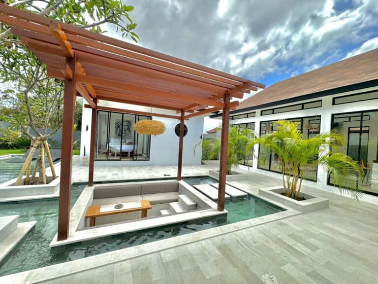 Modern villa with outdoor seating and pool