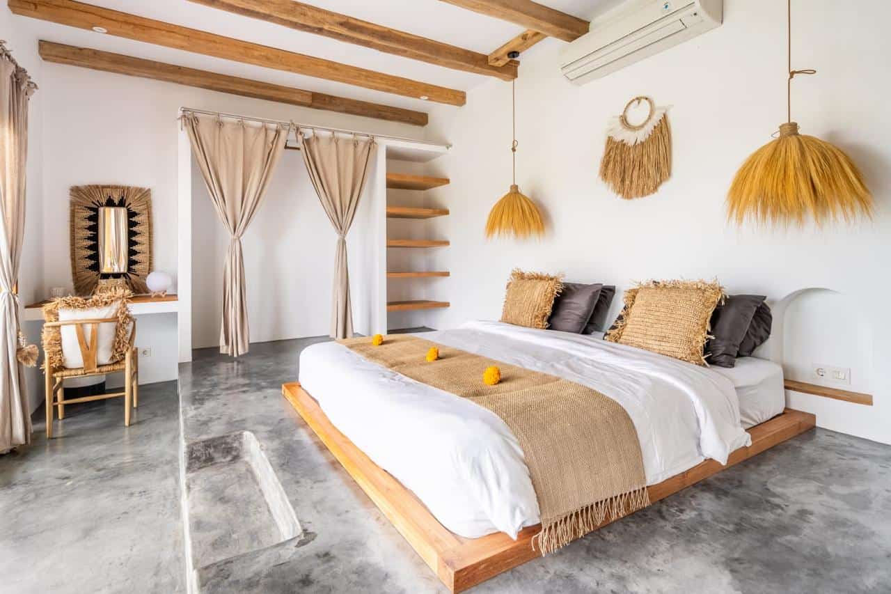 Modern bohemian bedroom with natural decor elements.