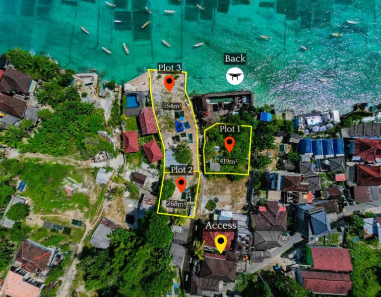Aerial view of plots by the ocean for sale.