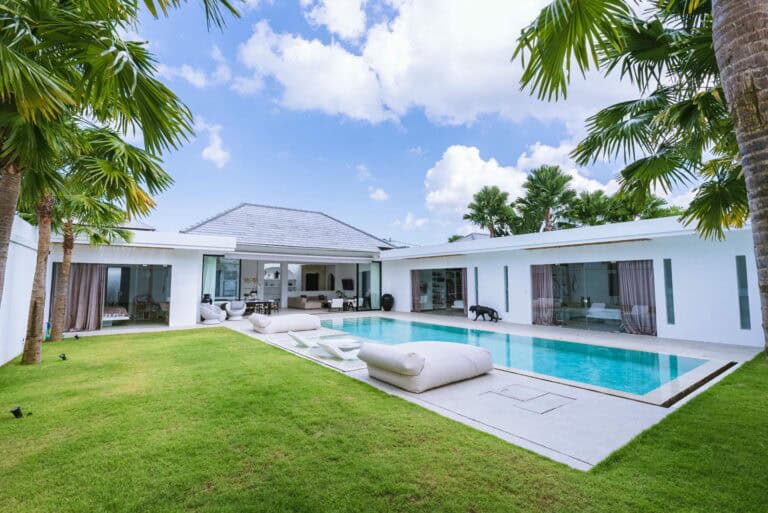 Luxurious villa with pool and palm trees