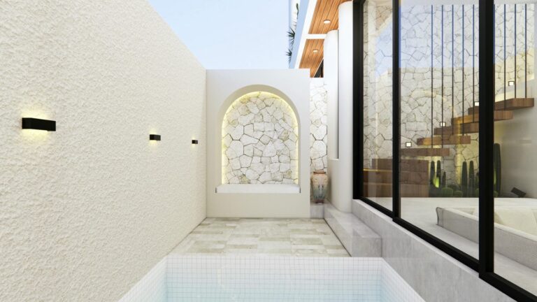 Minimalist courtyard with pool and modern lighting.