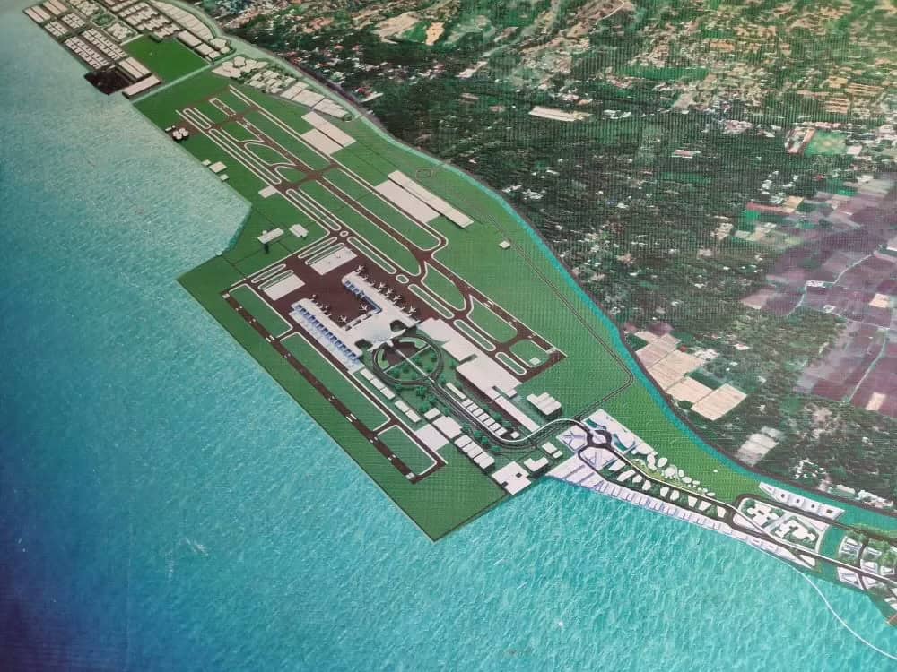 Aerial view of coastal airport layout.