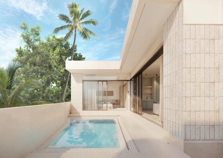 Luxury villa patio with pool and palm trees.