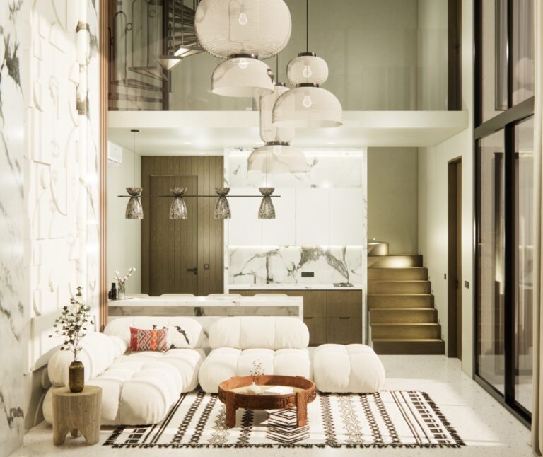 Modern living room with white sofa and marble kitchen.