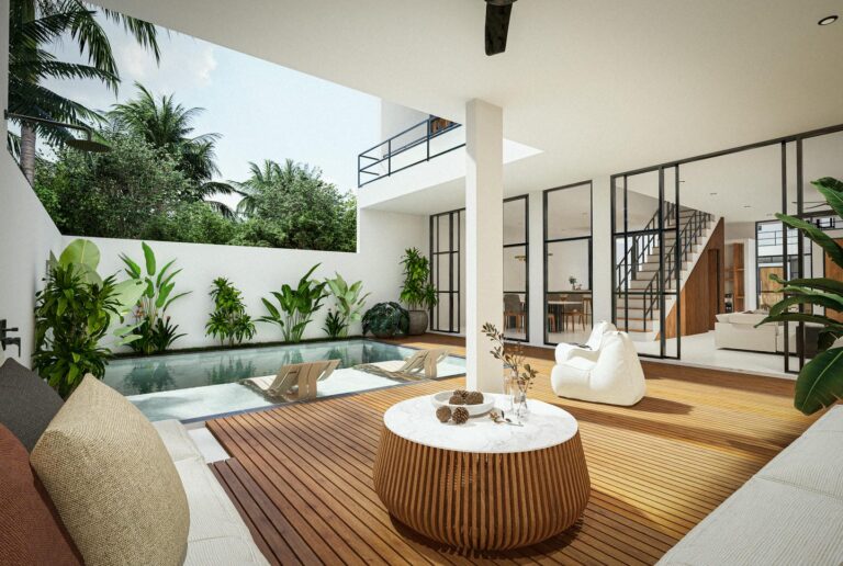 Modern patio with pool and lush greenery.