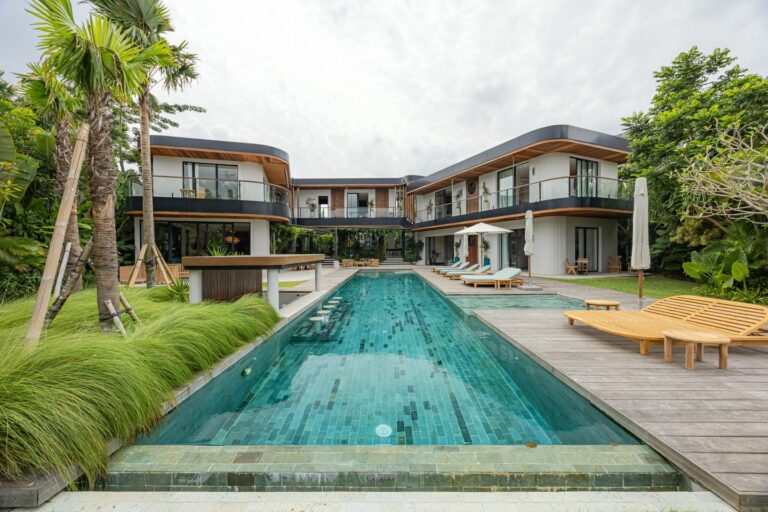 Modern villa with pool and greenery